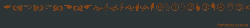 Шрифт Wingdings2 – коричневые шрифты на чёрном фоне