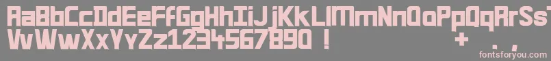 フォントQuirk33 – 灰色の背景にピンクのフォント