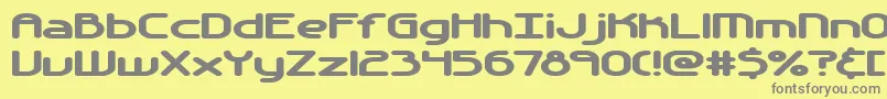 Automati-fontti – harmaat kirjasimet keltaisella taustalla