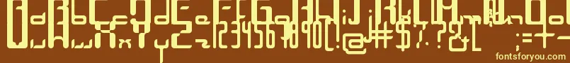 Unica-fontti – keltaiset fontit ruskealla taustalla