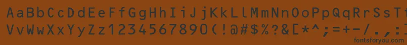 フォントOcrBcyr – 黒い文字が茶色の背景にあります