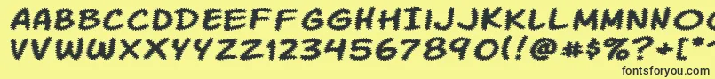 Komikatr Font – Black Fonts on Yellow Background