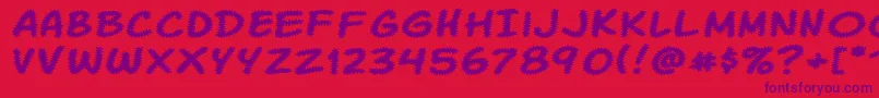 Komikatr Font – Purple Fonts on Red Background