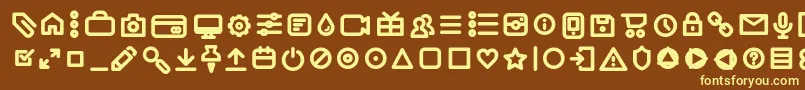 AristotelicaIconsDemiboldTrial-fontti – keltaiset fontit ruskealla taustalla