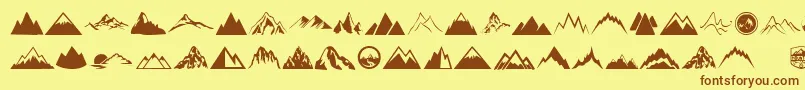 フォントMountain – 茶色の文字が黄色の背景にあります。