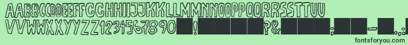 JmhEscamasOut Font – Black Fonts on Green Background