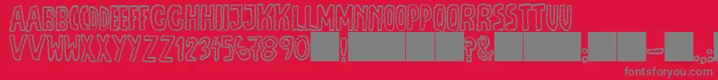 フォントJmhEscamasOut – 赤い背景に灰色の文字