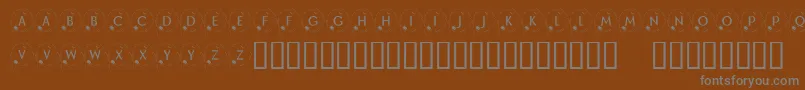 KrHappyNewYear2002-Schriftart – Graue Schriften auf braunem Hintergrund
