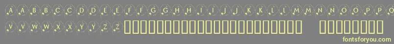 KrHappyNewYear2002 Font – Yellow Fonts on Gray Background