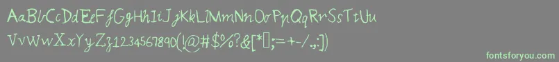 フォントMqsmagic – 灰色の背景に緑のフォント