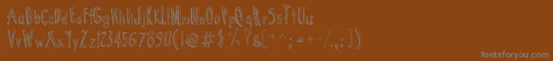 CartoonTunes Font – Gray Fonts on Brown Background