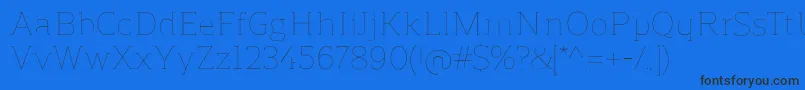 ReganslabUltralight Font – Black Fonts on Blue Background