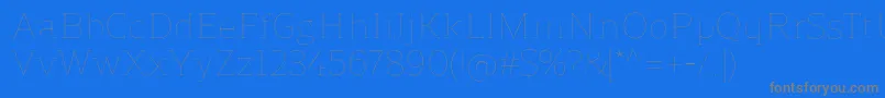 ReganslabUltralight Font – Gray Fonts on Blue Background
