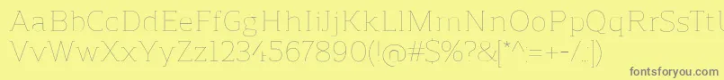 ReganslabUltralight Font – Gray Fonts on Yellow Background