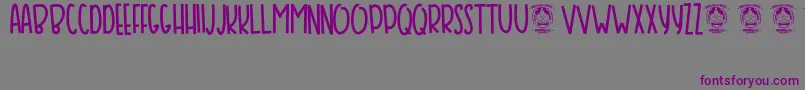 Bansky Font – Purple Fonts on Gray Background
