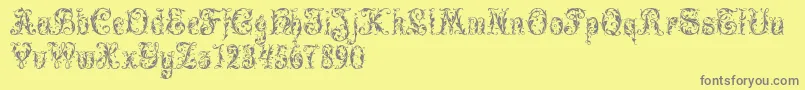 LeafyGlade-Schriftart – Graue Schriften auf gelbem Hintergrund