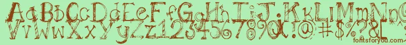 Pilotllj-Schriftart – Braune Schriften auf grünem Hintergrund