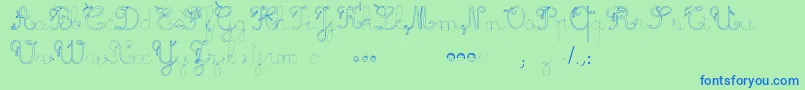 MaternellecolorTraceCursive3-fontti – siniset fontit vihreällä taustalla