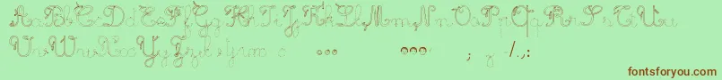 MaternellecolorTraceCursive3-Schriftart – Braune Schriften auf grünem Hintergrund