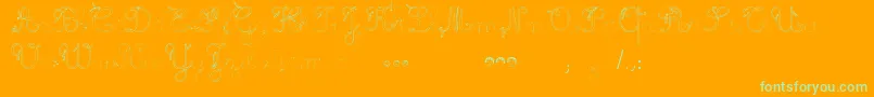 MaternellecolorTraceCursive3-Schriftart – Grüne Schriften auf orangefarbenem Hintergrund