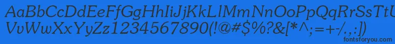 Czcionka SouvienneItalic – czarne czcionki na niebieskim tle