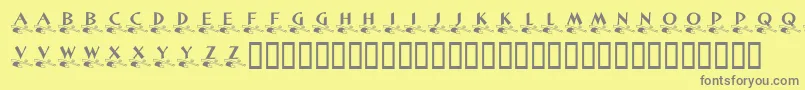 KrLittleLeague-fontti – harmaat kirjasimet keltaisella taustalla