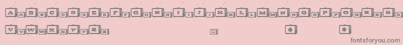 フォントTinyTube – ピンクの背景に灰色の文字
