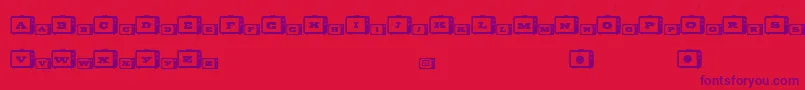 Czcionka TinyTube – fioletowe czcionki na czerwonym tle