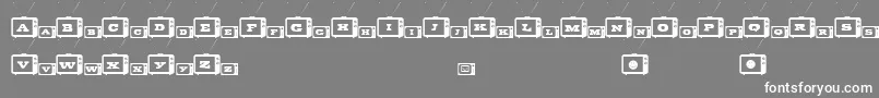 フォントTinyTube – 灰色の背景に白い文字