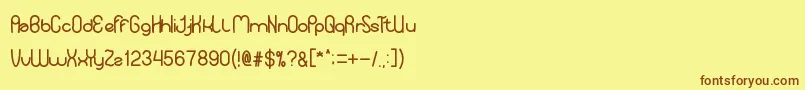 YourSmile Font – Brown Fonts on Yellow Background