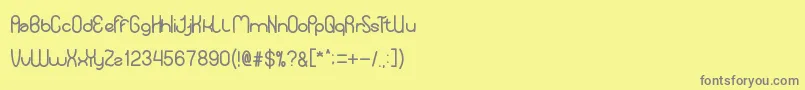 YourSmile Font – Gray Fonts on Yellow Background