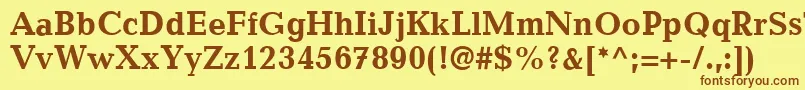 フォントCandidaLtBold – 茶色の文字が黄色の背景にあります。