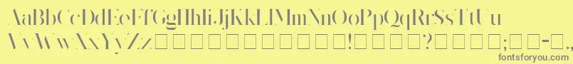 フォントKingsgmb – 黄色の背景に灰色の文字