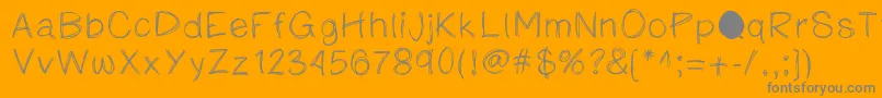Fonte Katesketchyprint – fontes cinzas em um fundo laranja