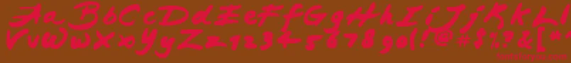 フォントJapaneseBrush – 赤い文字が茶色の背景にあります。