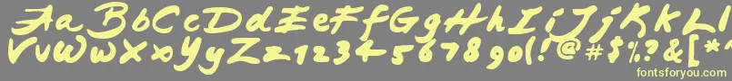 JapaneseBrush Font – Yellow Fonts on Gray Background