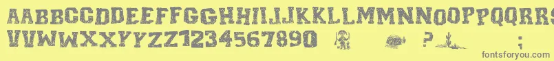 CordelEncarnadoI-fontti – harmaat kirjasimet keltaisella taustalla
