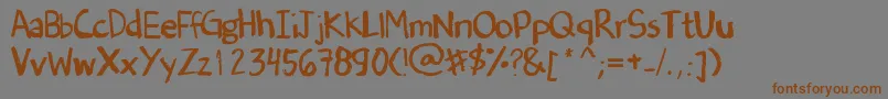 Fonte DenneSOldHandwriting – fontes marrons em um fundo cinza