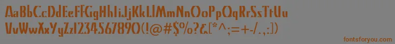 フォントKinomtstd – 茶色の文字が灰色の背景にあります。