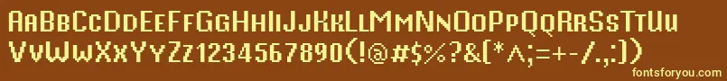 MisterPixel16PtSmallCaps-fontti – keltaiset fontit ruskealla taustalla