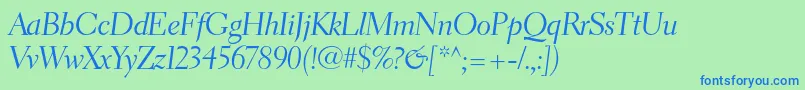 ElectraltstdCursivedisplay-fontti – siniset fontit vihreällä taustalla