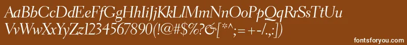 ElectraltstdCursivedisplay-fontti – valkoiset fontit ruskealla taustalla