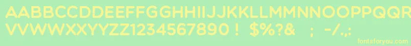 フォントMulticolore – 黄色の文字が緑の背景にあります