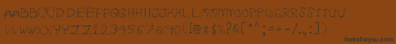 AutumnpixelsRegular Font – Black Fonts on Brown Background