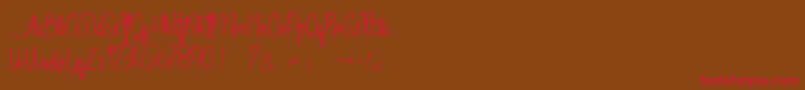 Anacondas Font – Red Fonts on Brown Background