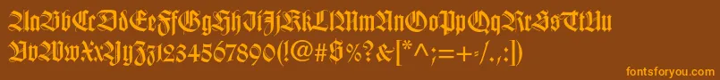 Fonte Wilhelmklingsporgotltstd – fontes laranjas em um fundo marrom