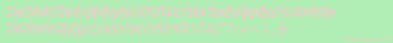 Fonte Wilhelmklingsporgotltstd – fontes rosa em um fundo verde
