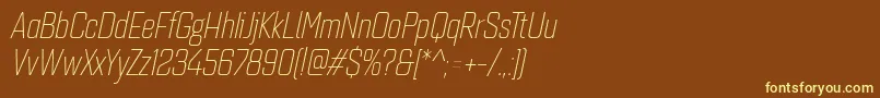 Quarcacondlightitalic-fontti – keltaiset fontit ruskealla taustalla