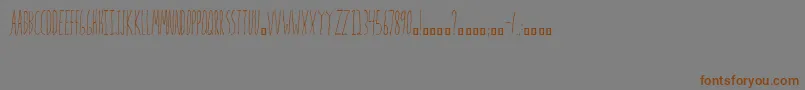 Mrs.Strange Font – Brown Fonts on Gray Background
