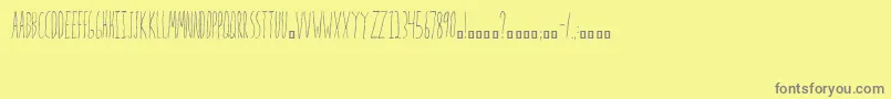 Mrs.Strange Font – Gray Fonts on Yellow Background